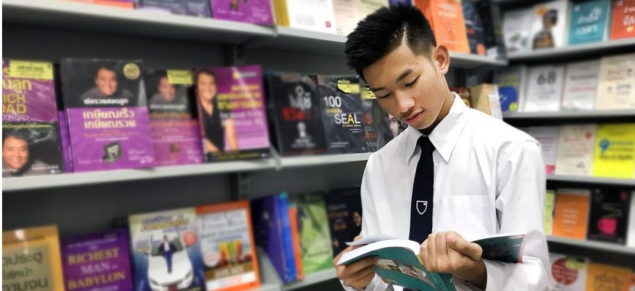 student with book